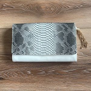 Francesca’s Collections snakeskin clutch